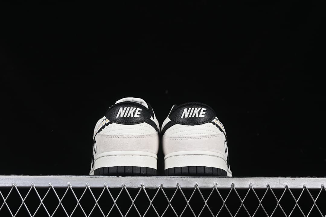 Rear view of the pair showing Nike heel tabs and black outsoles