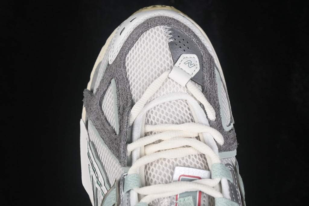 Close-up of the breathable mesh toe box, laces and layered overlays.