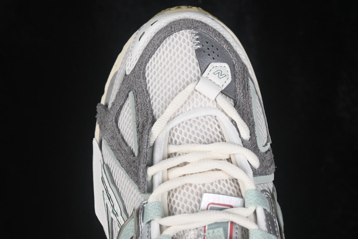 Close-up of the breathable mesh toe box, laces and layered overlays.