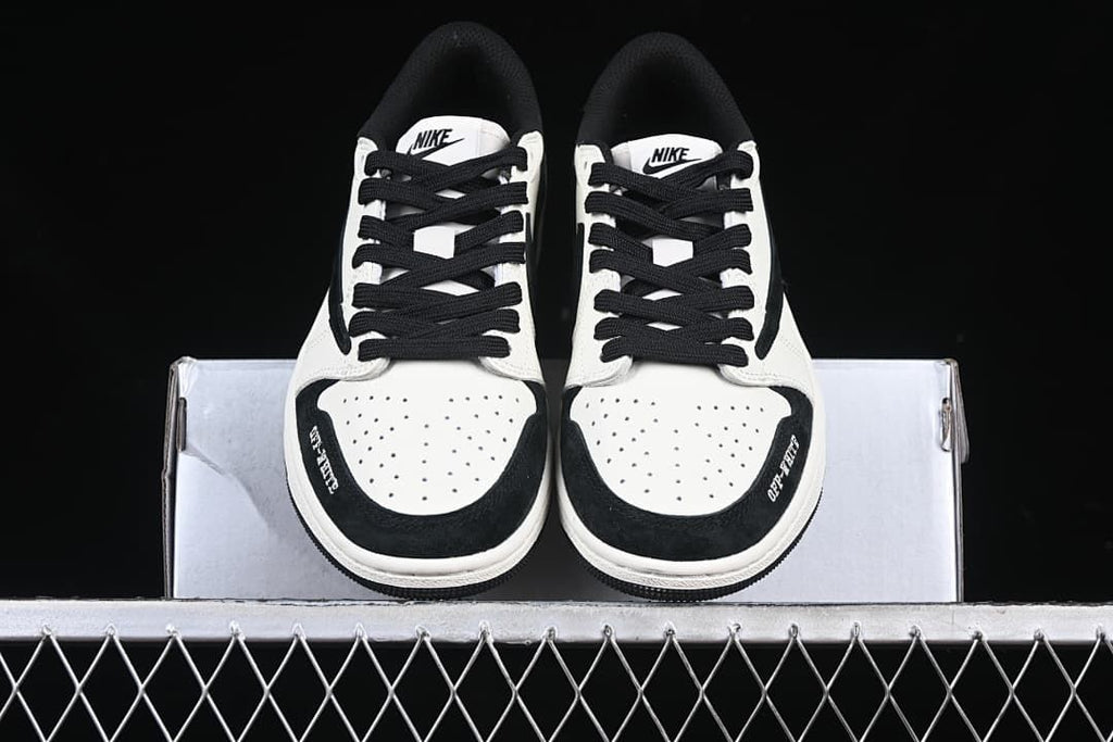 Front view of the pair showing perforated toes and black laces.
