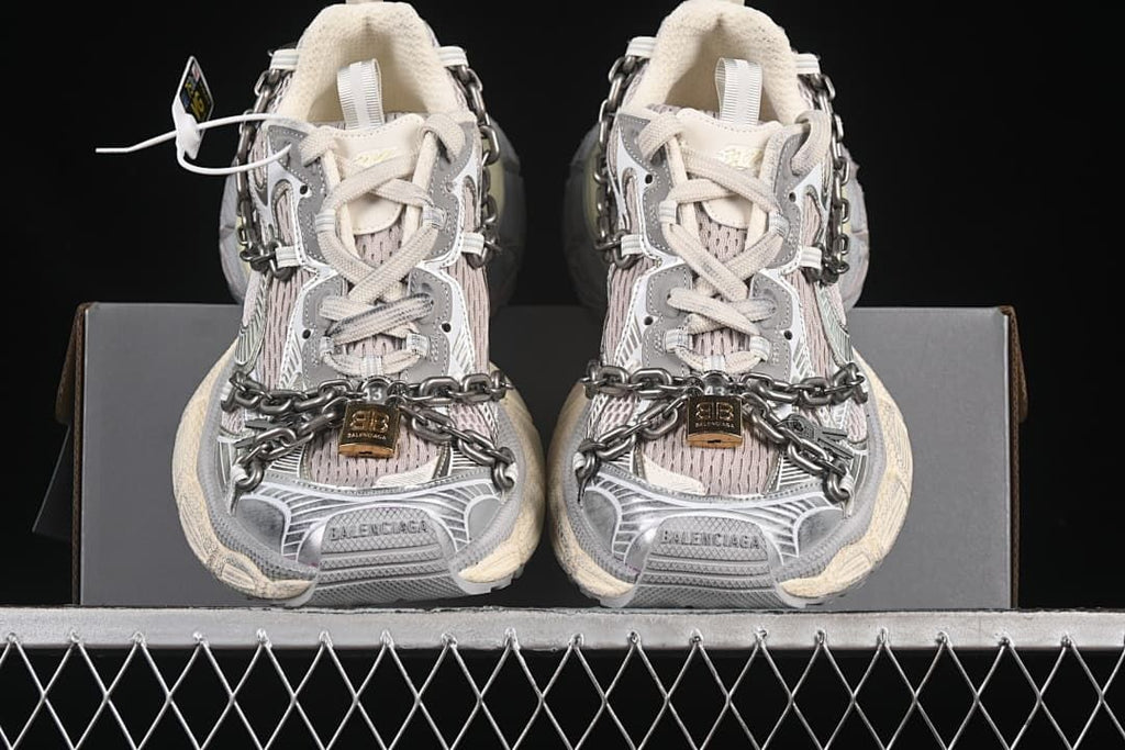 Front view of the pair showing the chunky toe and chain details.