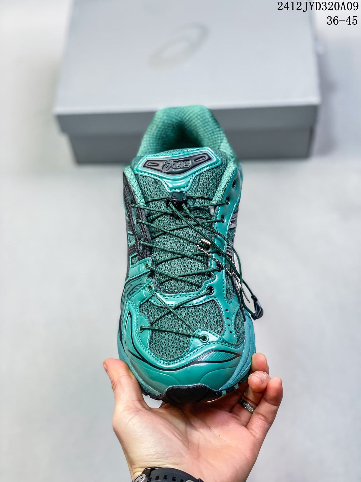 Top view of the teal mesh ASICS sneaker and laces; image text shows 36–45 and 2412JYD320A09.