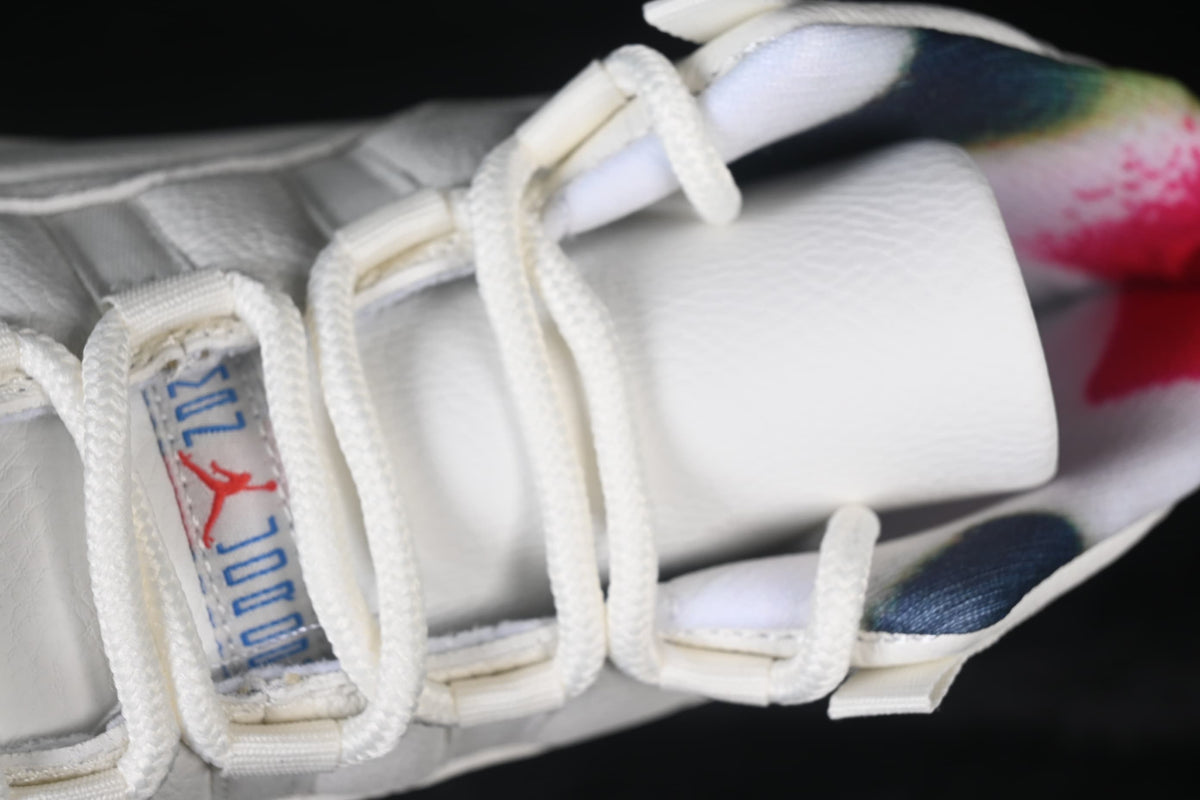 Close-up of the laces, tongue label, and multicolor collar.