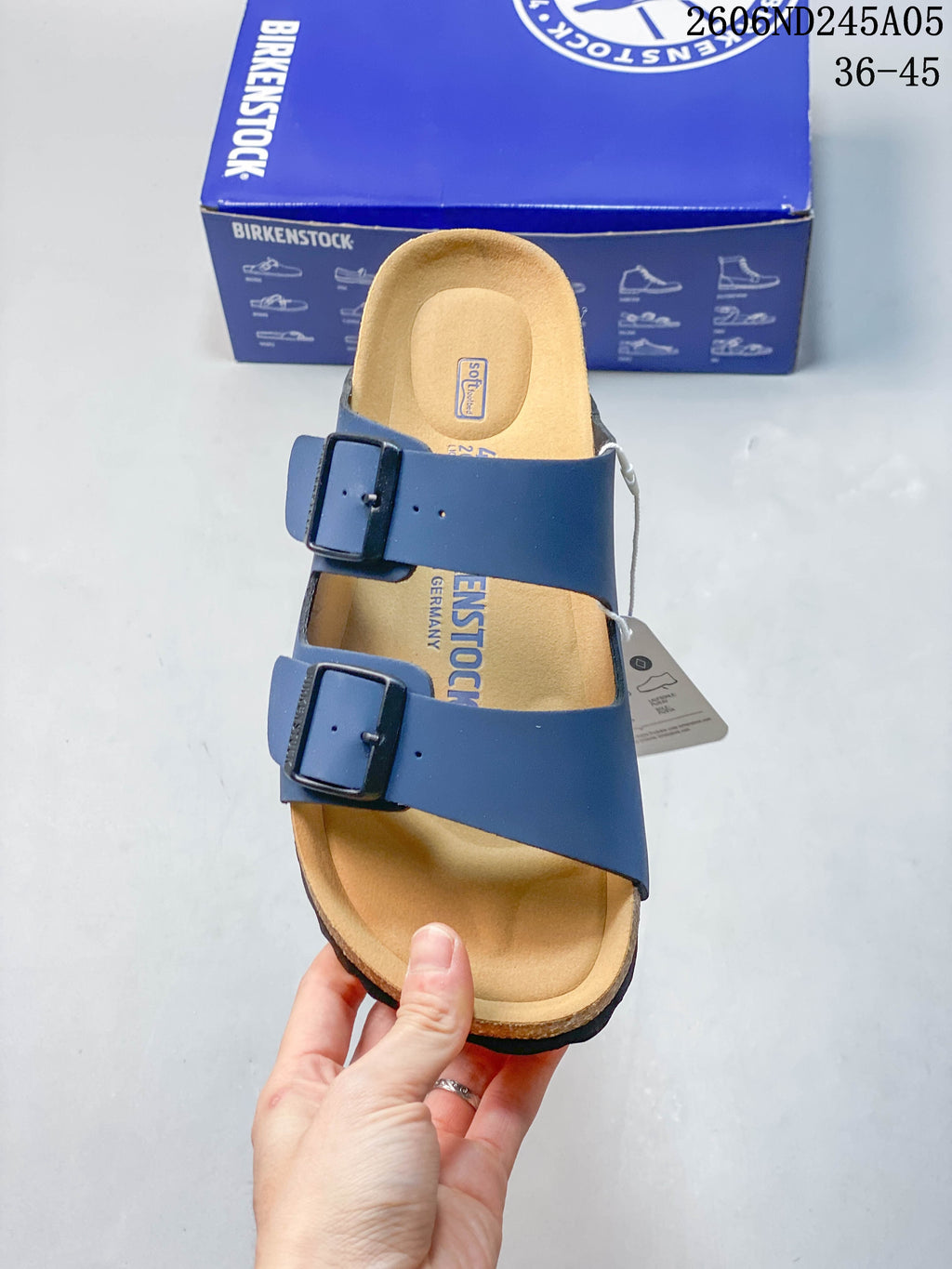 Top view of the blue two-strap sandal, showing the adjustable buckles and contoured footbed.