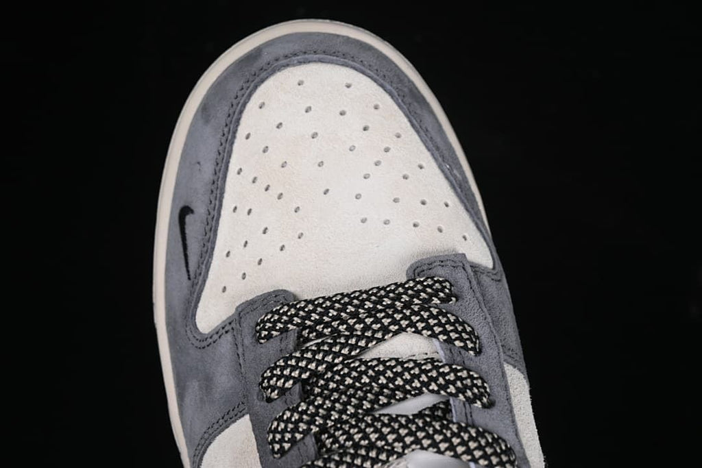 Top-down close-up of the perforated toe and laces