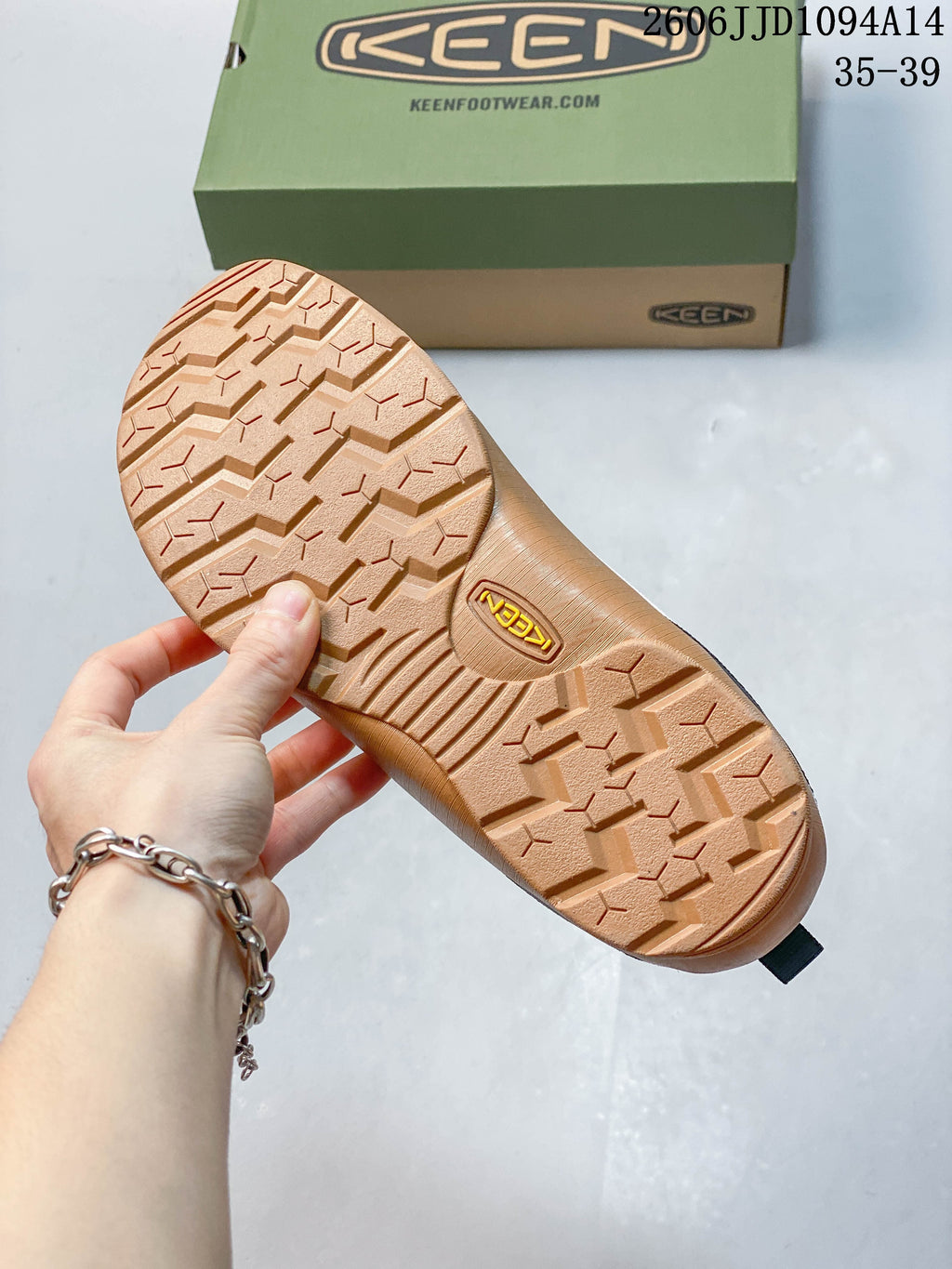 Close-up of the patterned gum-toned outsole on a KEEN Jasper sneaker