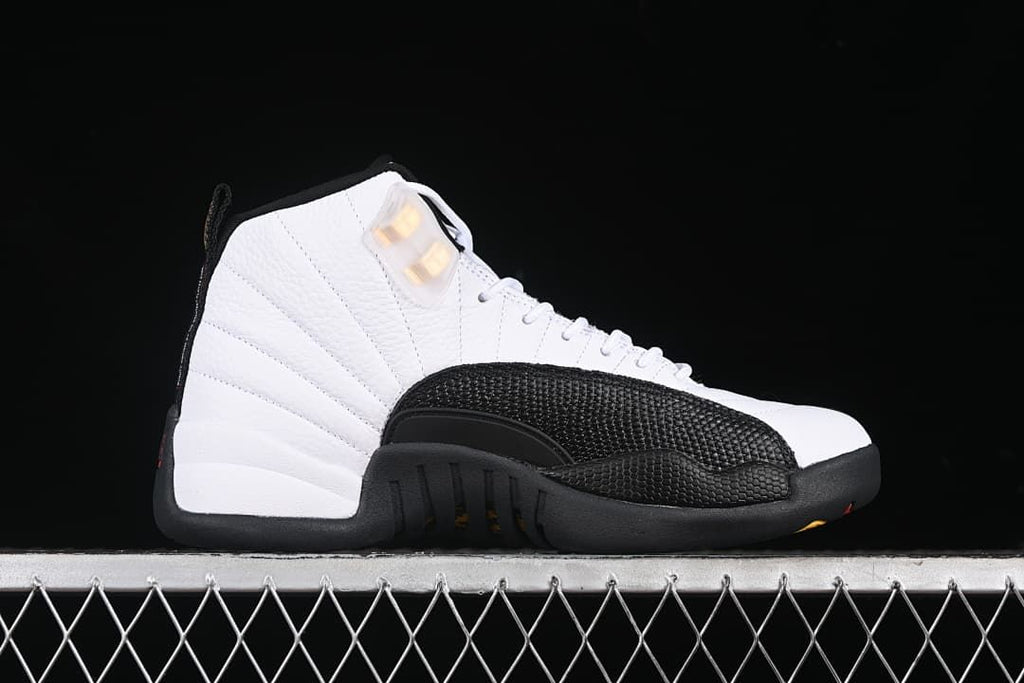 Side profile of the white and black high-top sneaker.