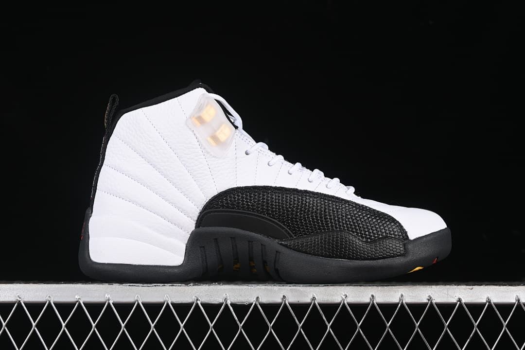 Side profile of the white and black high-top sneaker.