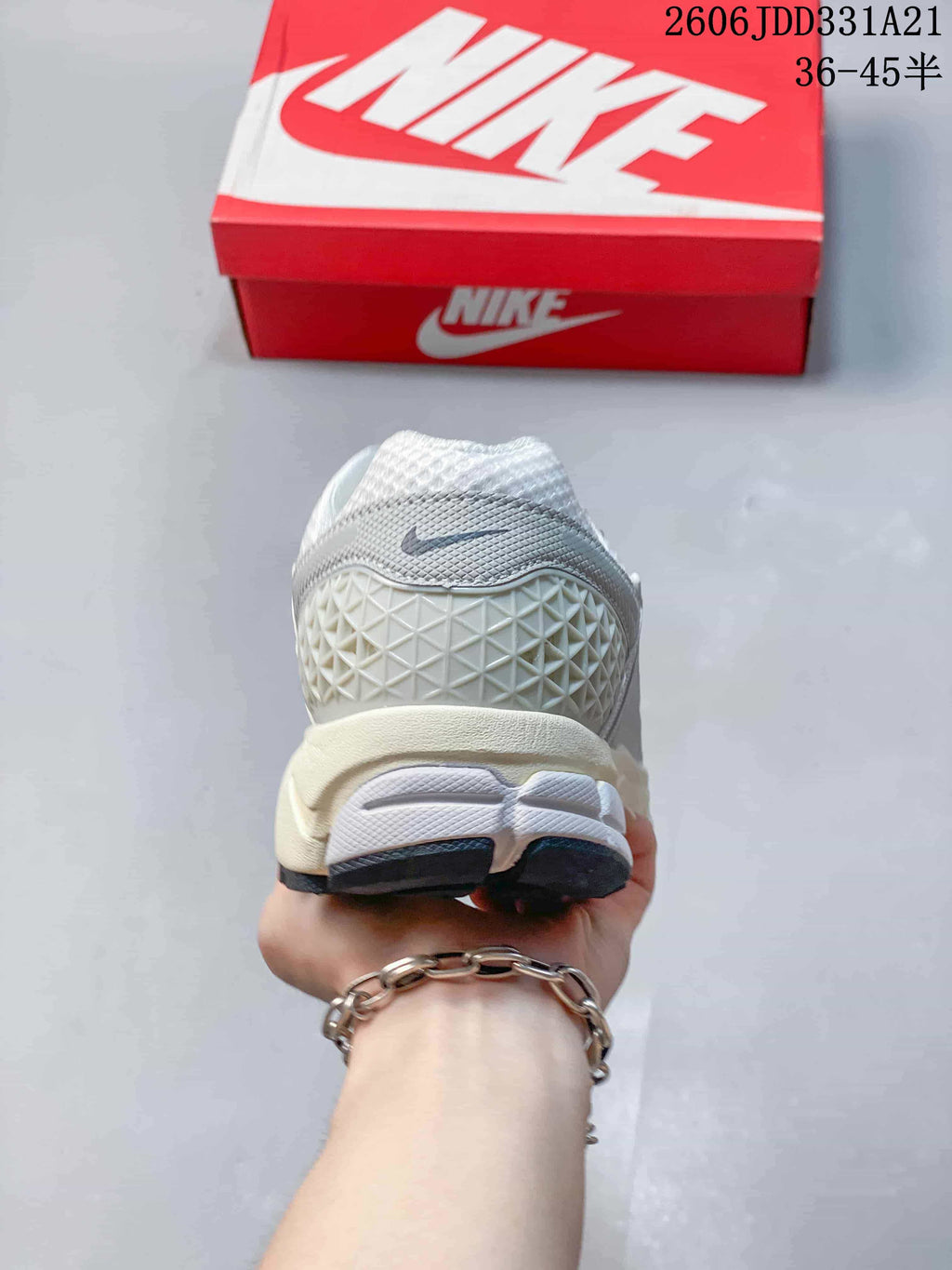 Rear view of the Nike Zoom Vomero 5 showing the heel panel and midsole