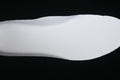 White outsole shown against a dark background.