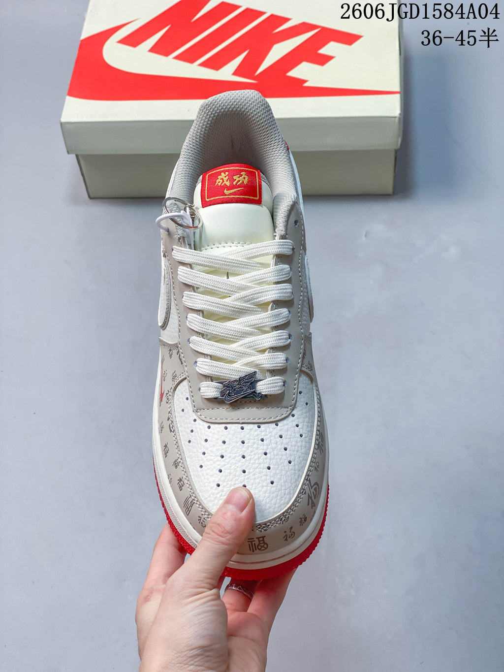 Top view showing the perforated toe, white laces, and decorative lace accessory
