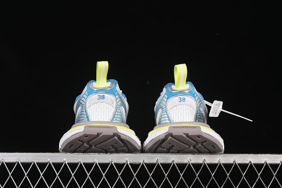 Rear view of both sneakers and their outsoles