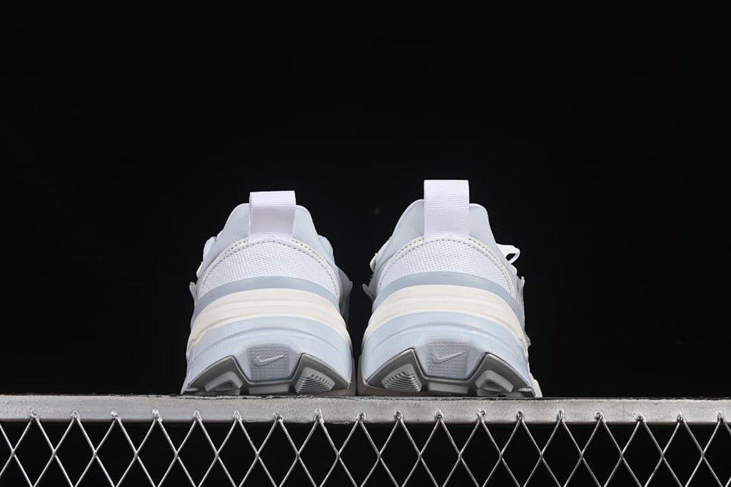 Rear view of the pair showing the heels and outsole details