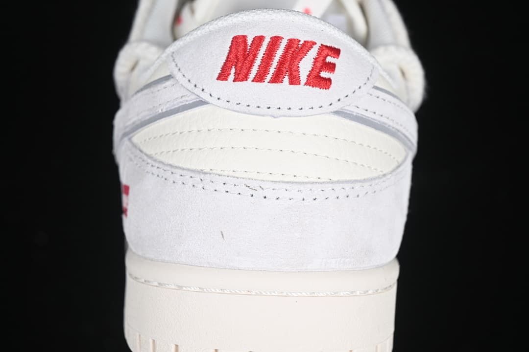 Rear view showing a red Nike logo on the heel tab