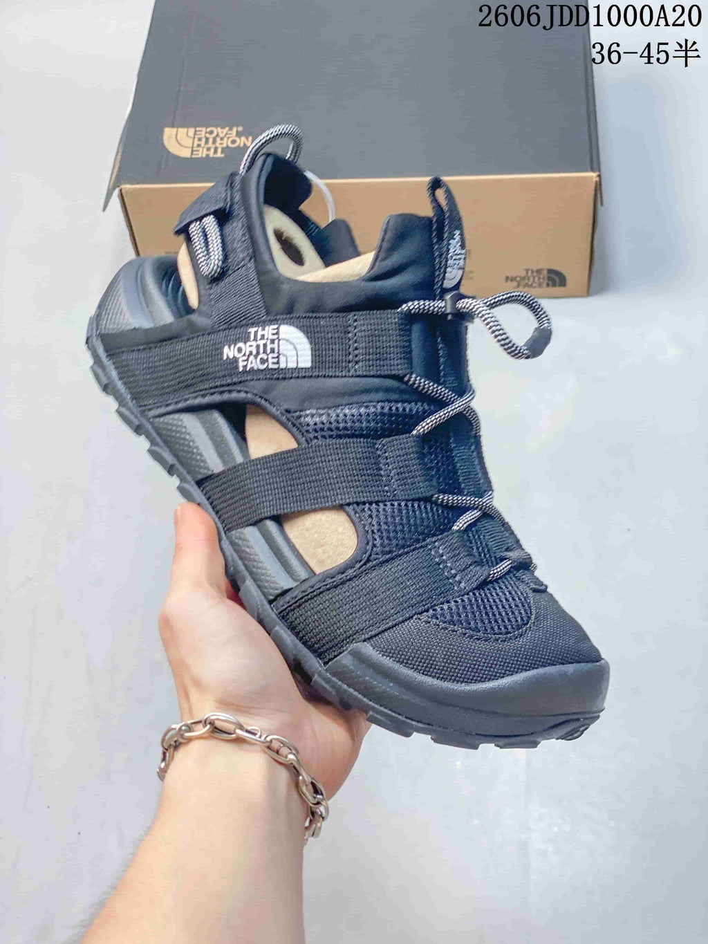 Side profile of a Cedar Measa sandal with open panels, webbing straps and a rugged sole