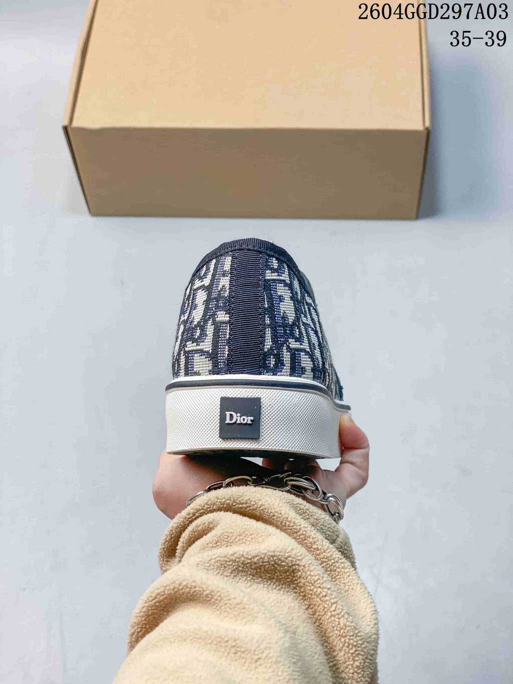 Rear view of the sneaker showing the heel branding and white sole