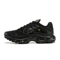 Black Nike Air Max Plus sneaker with dark patterned panels and black sole.