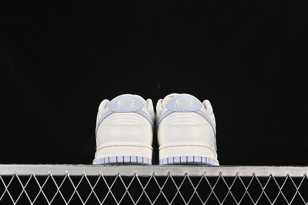 Rear view of both sneakers