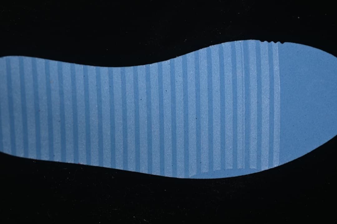 Blue outsole insert shown against a black background