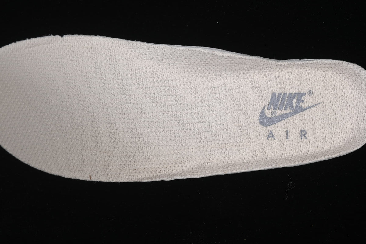 Close-up of a light-colored insole with Nike Air branding