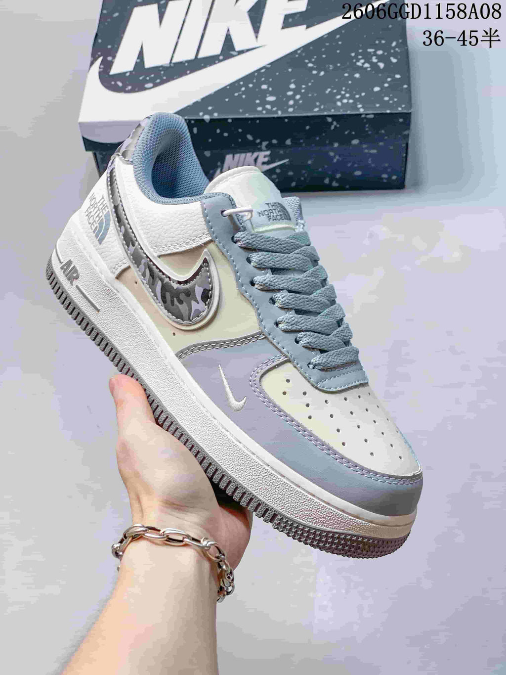 Angled close-up of the sneaker's side, laces, and patterned accent