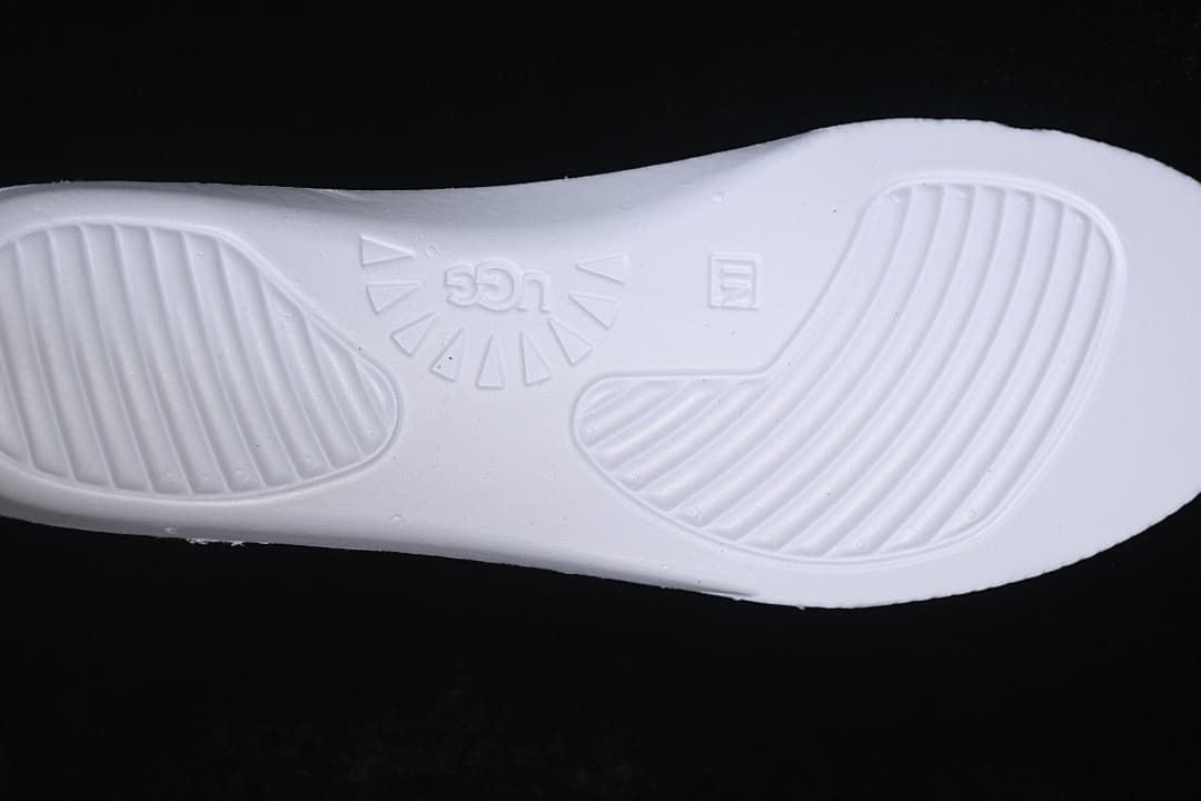 Underside of the sneaker's off-white insole with UGG marking