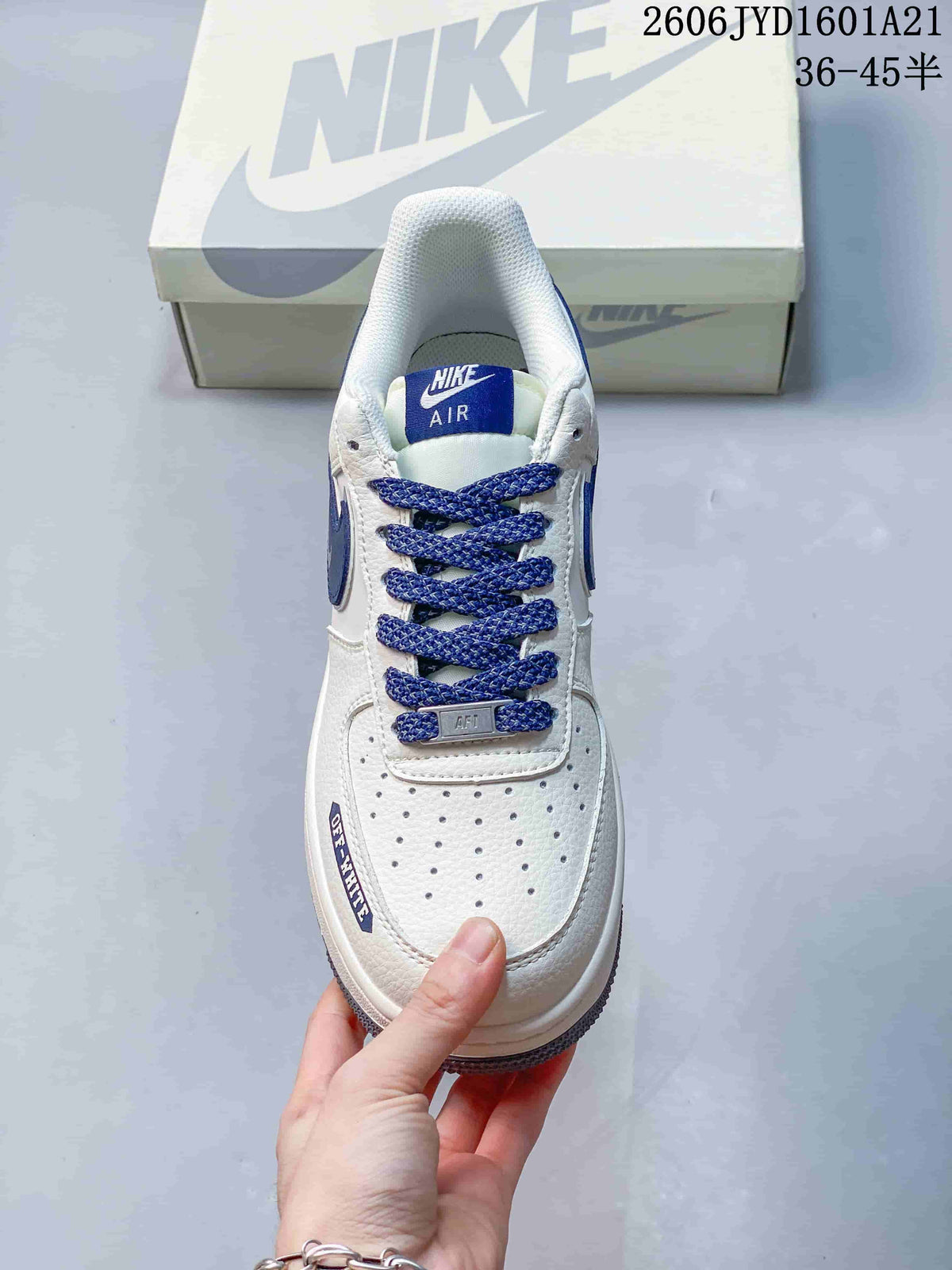 Top view of the sneaker with blue laces and perforated toe