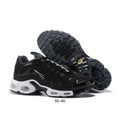 Black Nike Air Max Plus-style sneakers with a white midsole and visible cushioning windows.