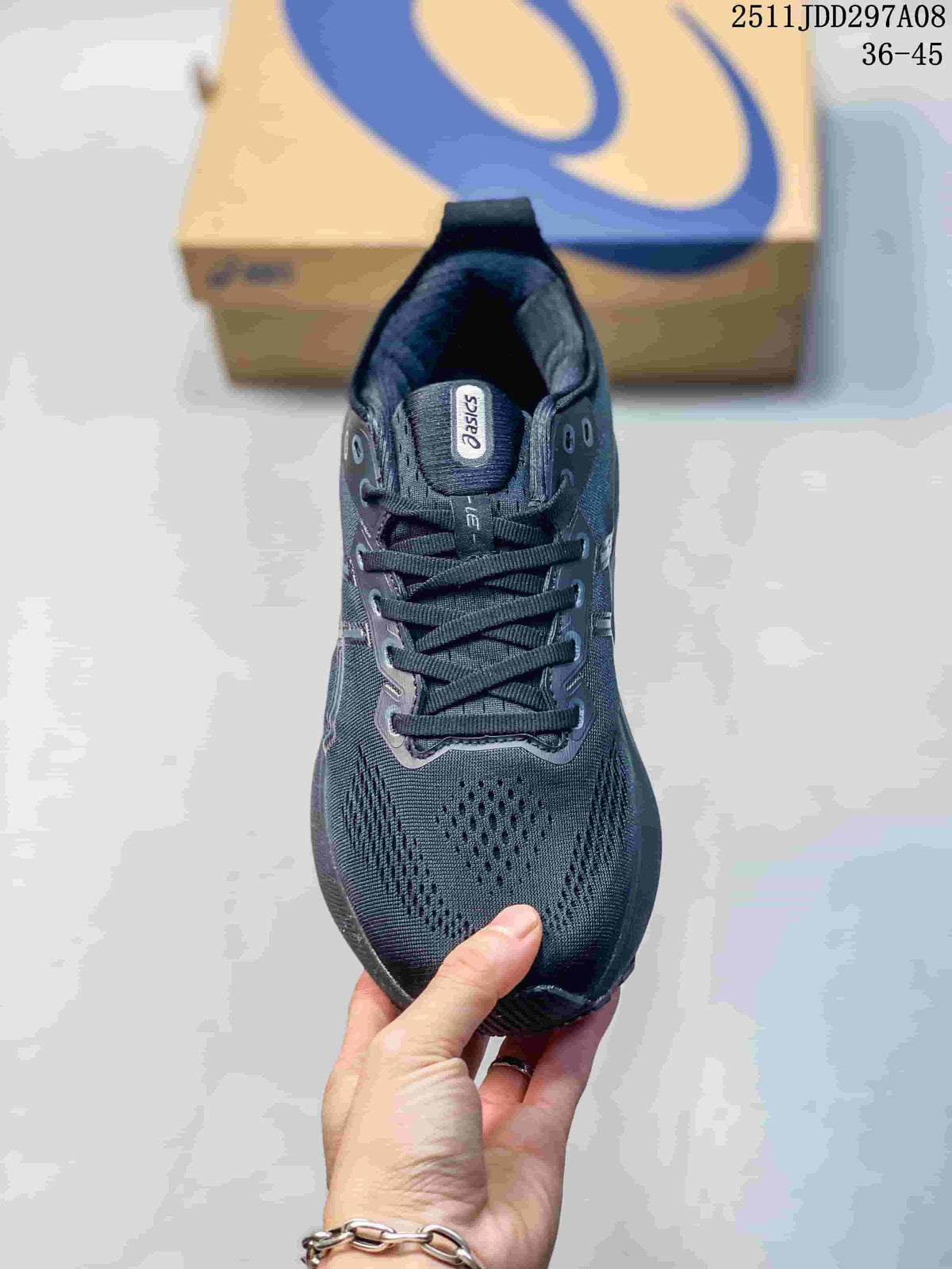 Top view of a dark charcoal lace-up running sneaker with perforated toe panels