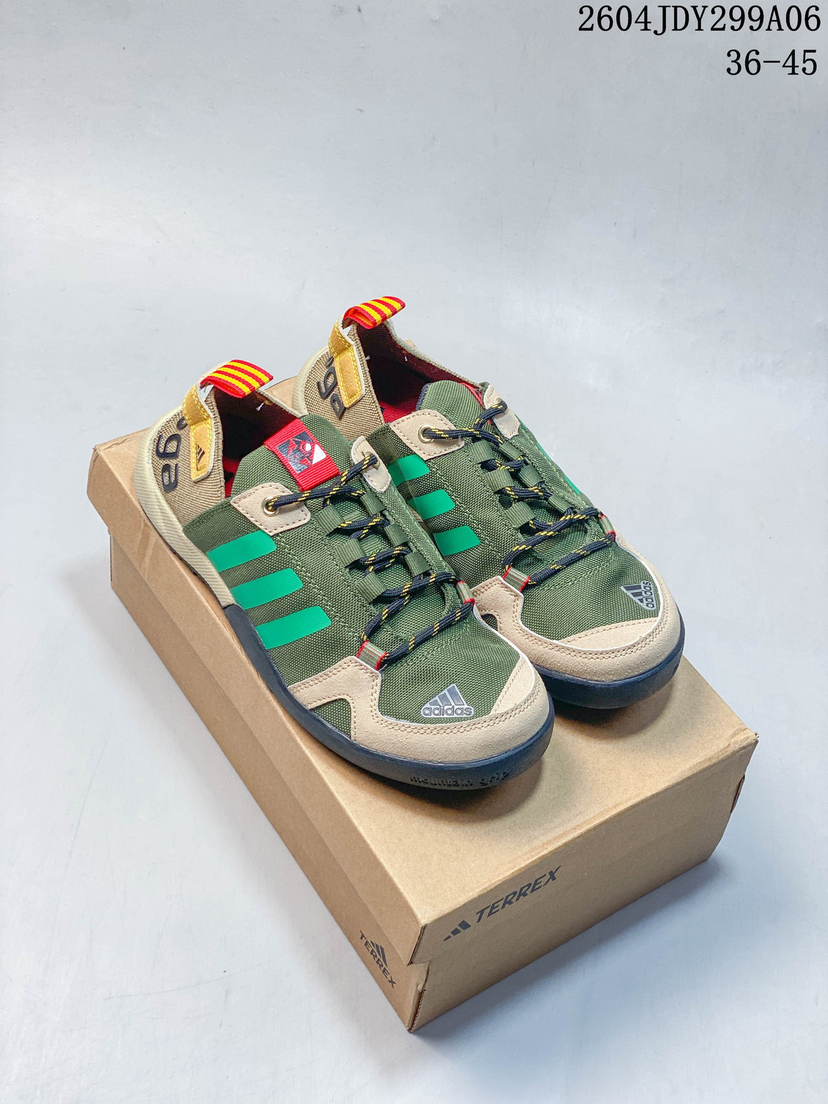 Pair of olive green Adidas Climacool Boat Lace Graphic shoes with beige overlays and bright green stripes