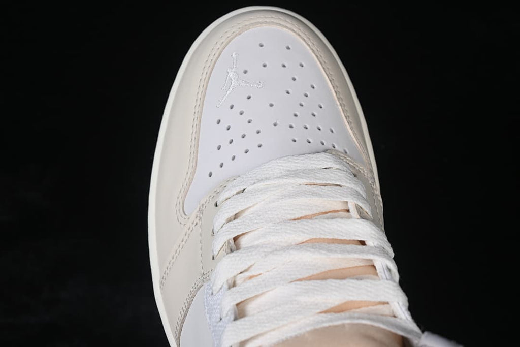 Top view of the perforated toe and laces