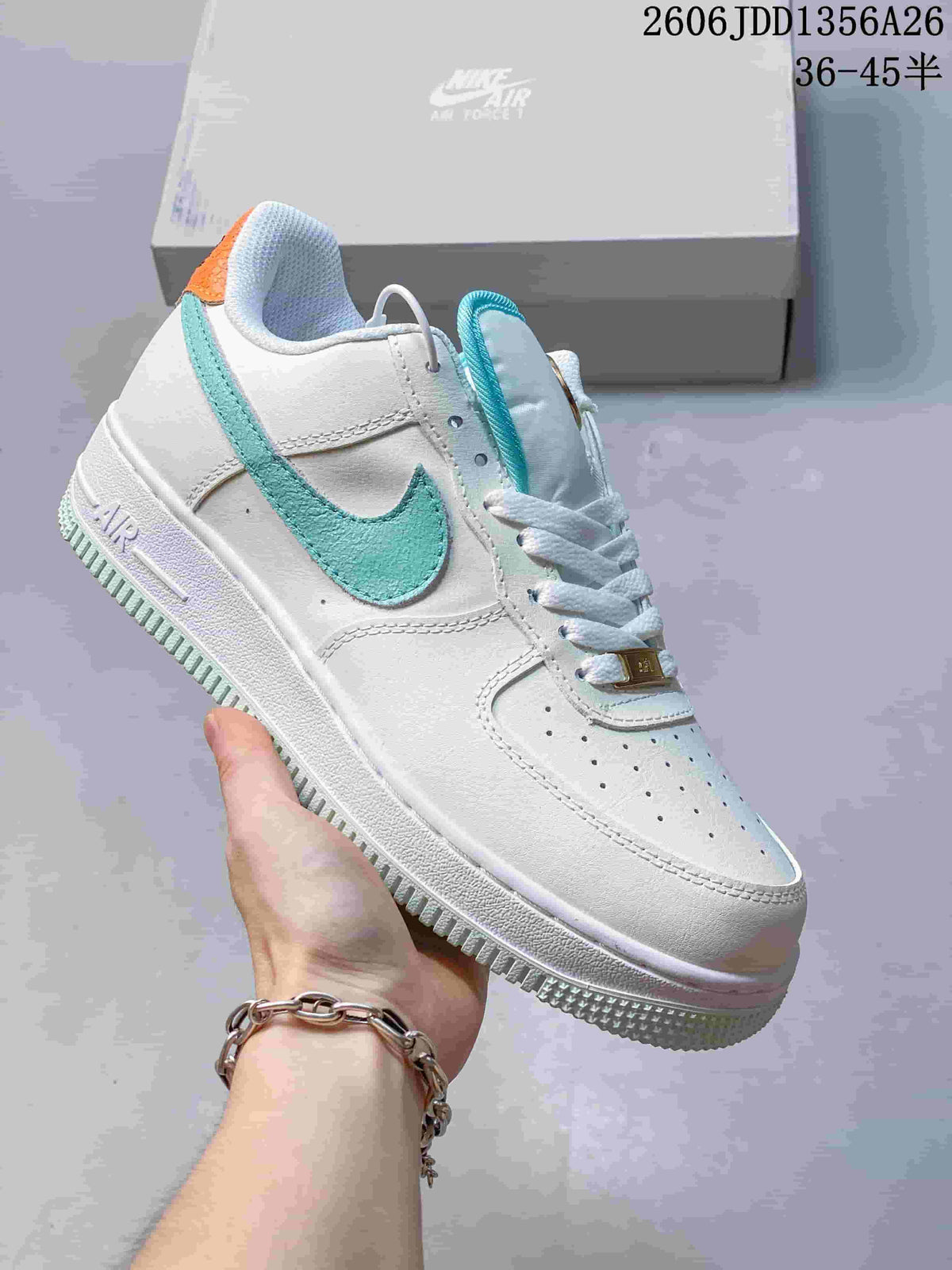 White Nike Air Force 1 low-top sneaker with turquoise Swoosh and accents