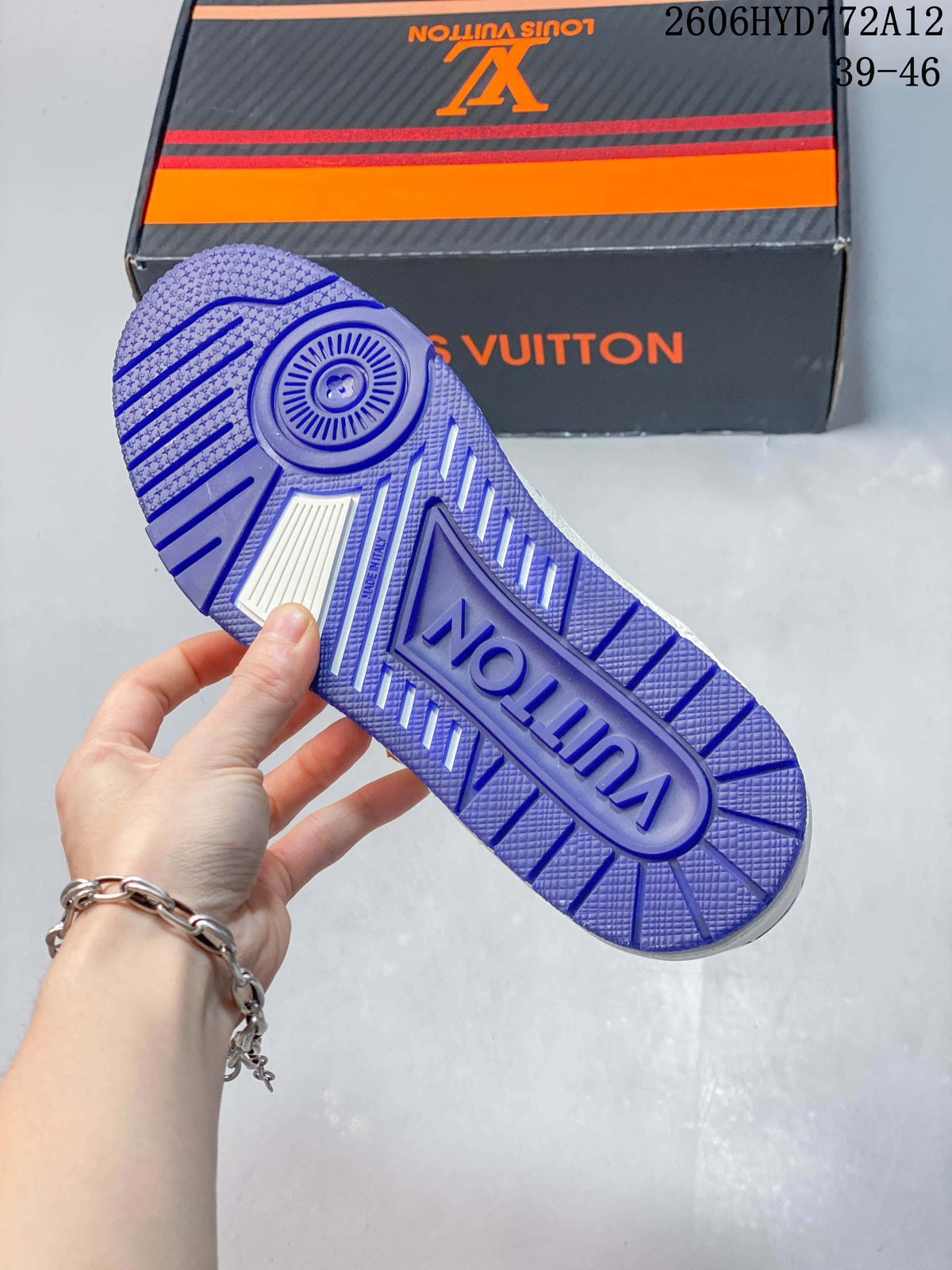 Close-up of the blue patterned outsole of a white sneaker