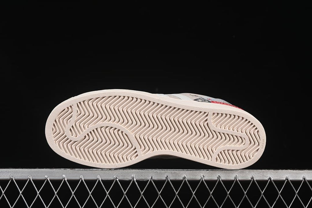Underside view showing the patterned light-colored outsole.