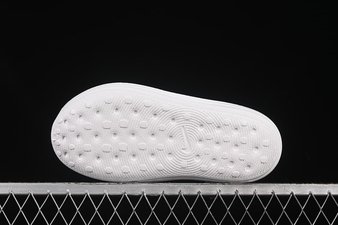 Underside view showing the textured outsoles