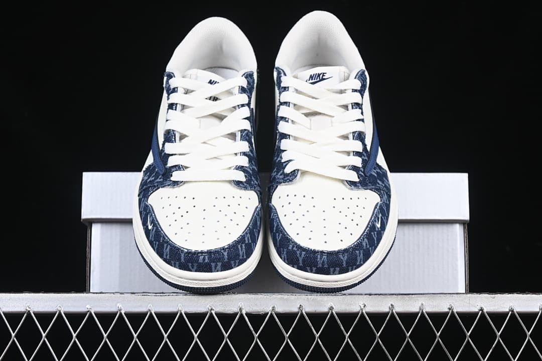 Front view of the pair showing perforated toes and patterned overlays