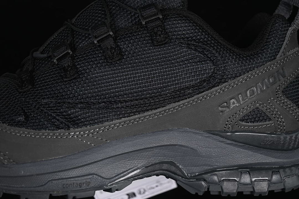 Close-up of the shoe's side mesh, overlays and outsole lettering