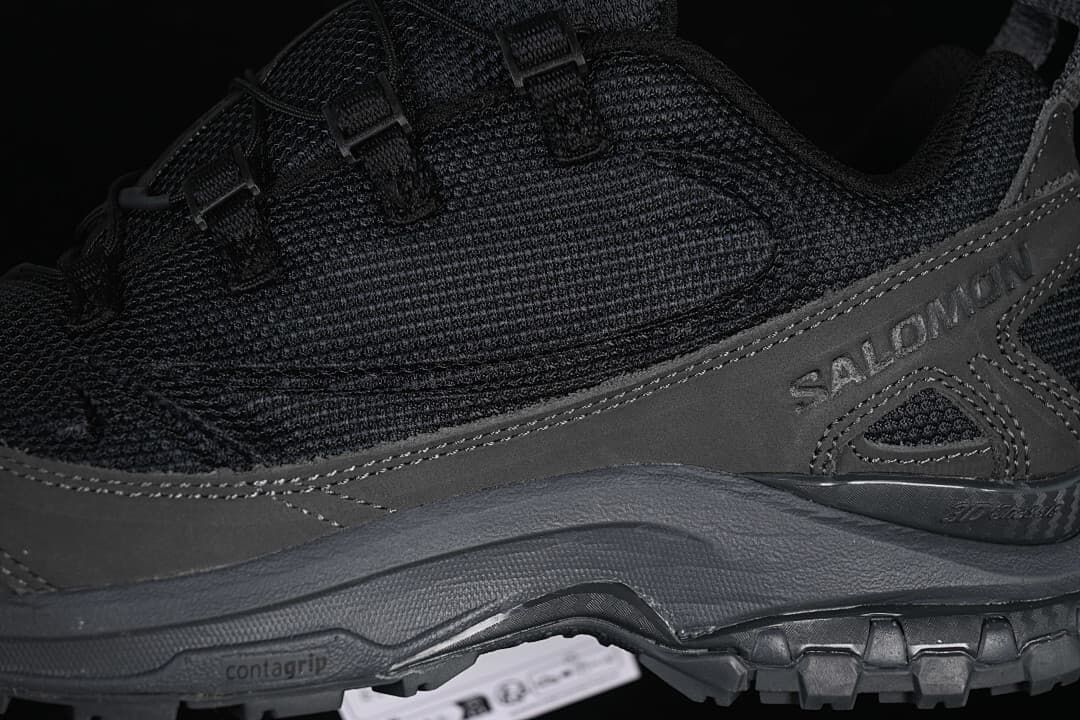 Close-up of the shoe's side mesh, overlays and outsole lettering