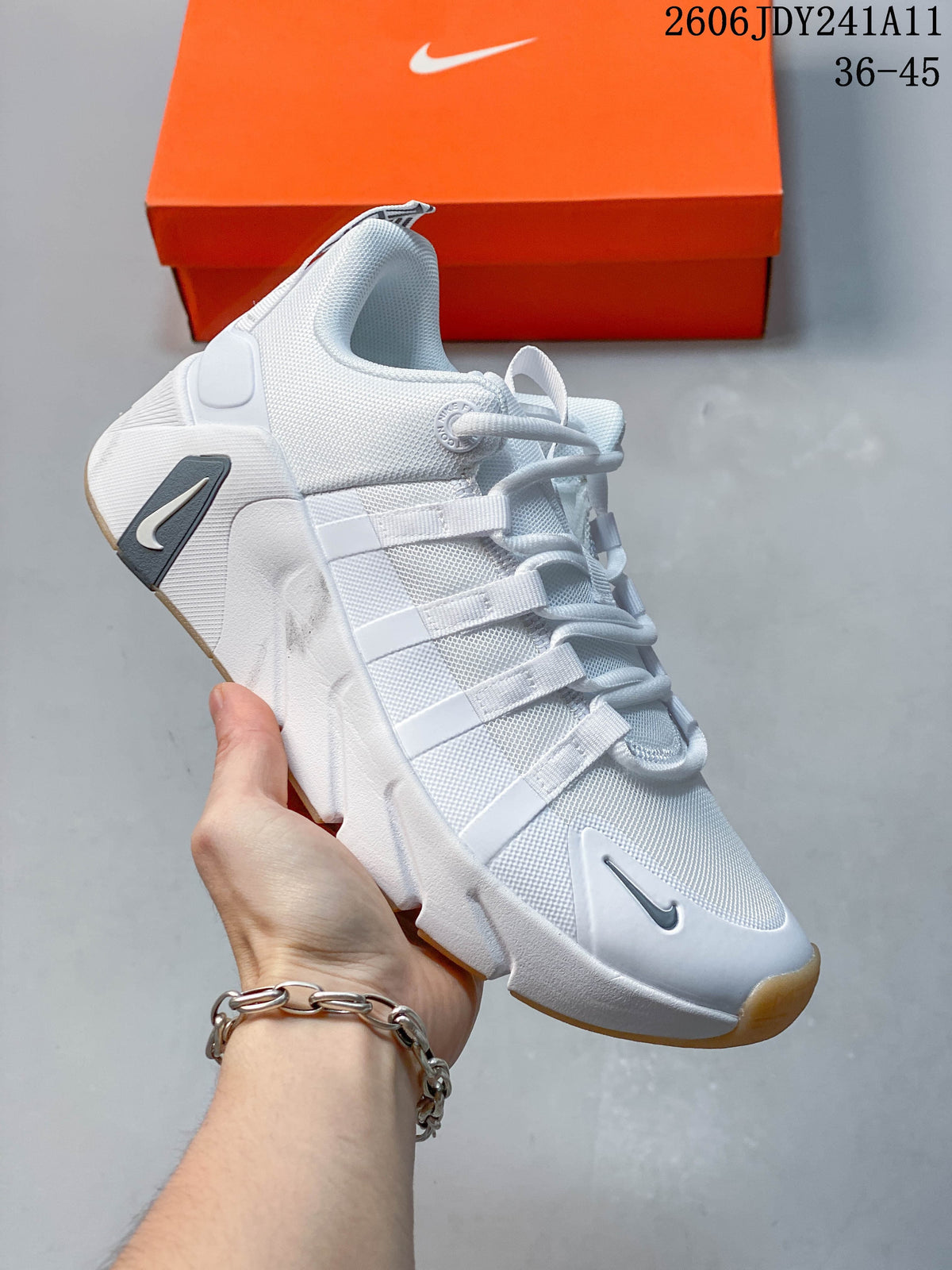 White Nike Free Metcon 7 training shoe with gray accents and a warm-toned outsole detail.