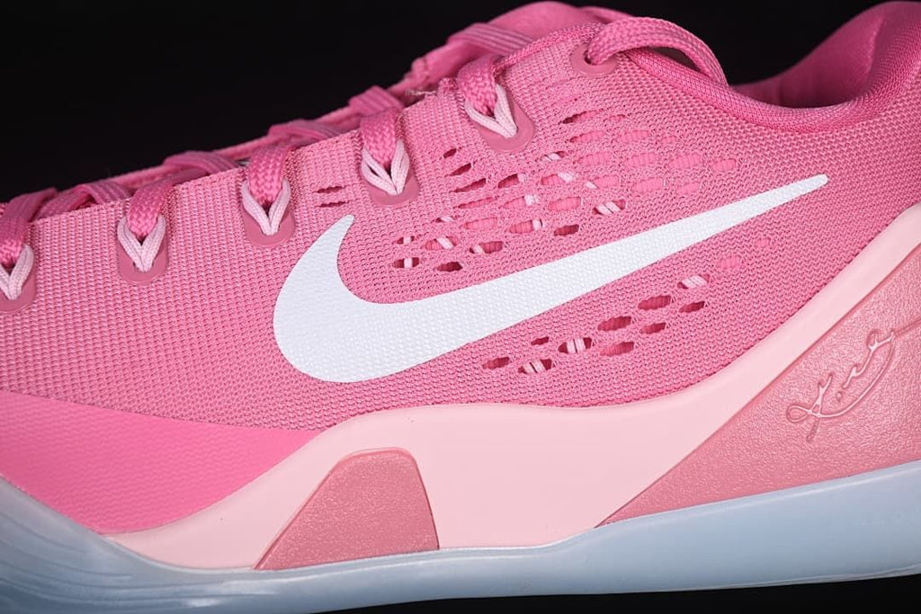 Close-up of the side logo, perforated upper, and layered midsole