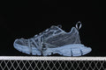 Side view of blue denim-look chunky sneakers with a sculpted outsole