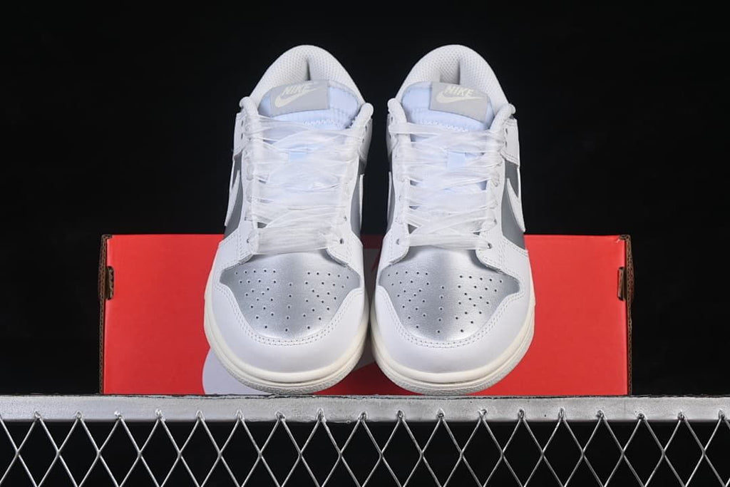 Front view of the pair showing perforated silver toe panels