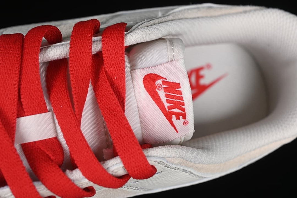 Close-up of red laces and tongue label
