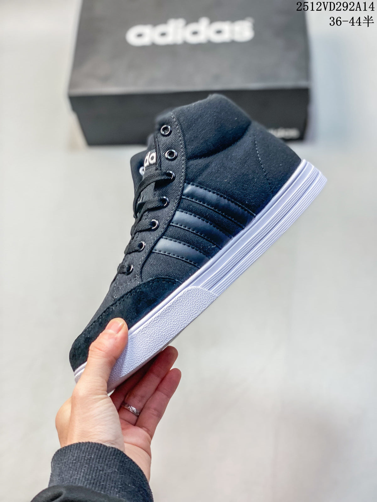 Side profile of a dark Adidas VS Set Mid high-top sneaker with three stripes and a white sole.