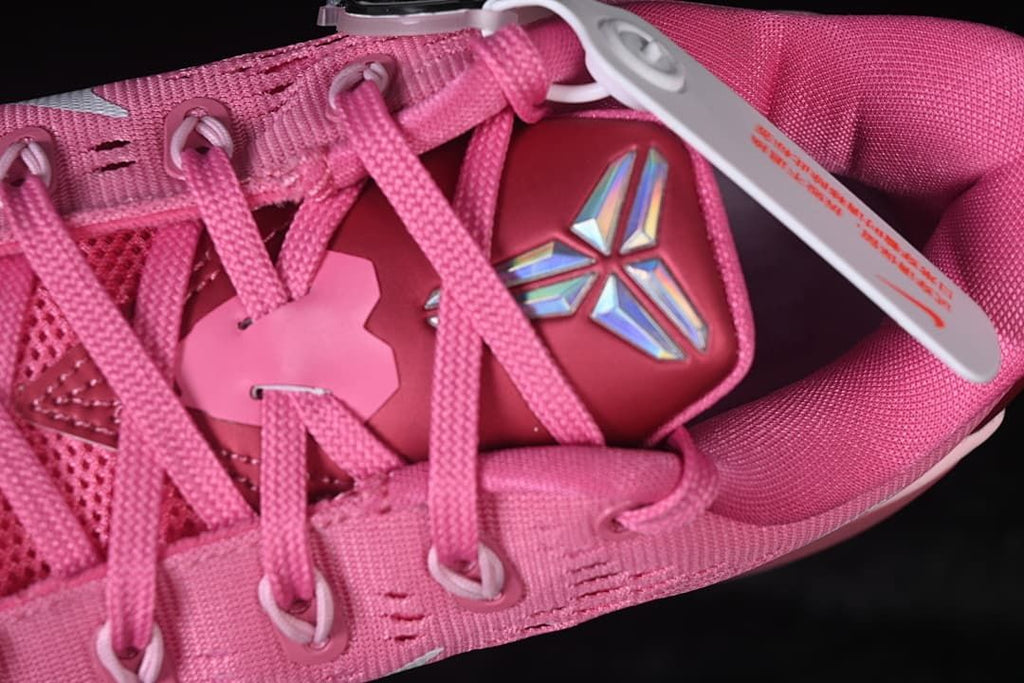 Close-up of the laces, tongue emblem, and attached tag