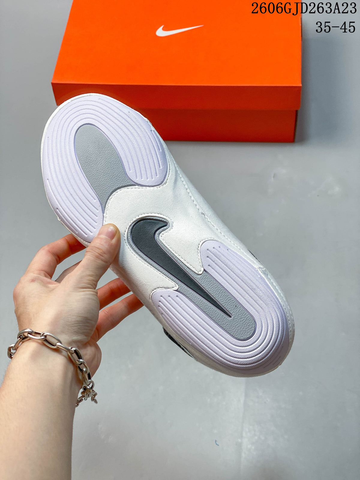 Underside of a Nike wrestling shoe showing a textured outsole