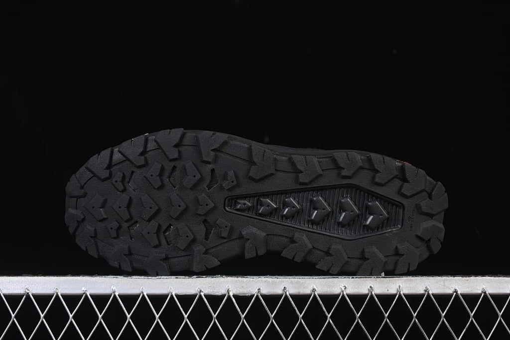 Underside view showing the deeply patterned outsole