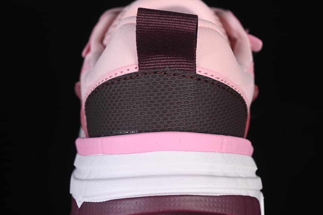 Rear view showing the heel panel and layered midsole