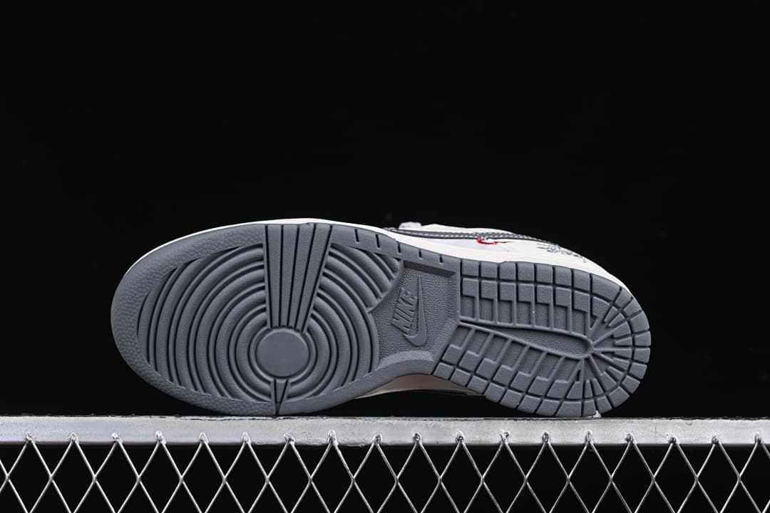 Underside view showing the dark grey tread pattern
