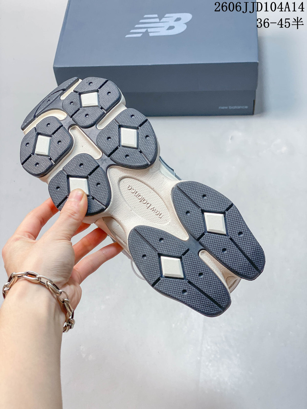 Underside of a New Balance 9060 sneaker showing the segmented outsole